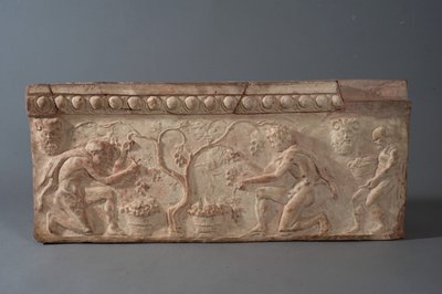 Plaque with satyrs harvesting grapes by Roman